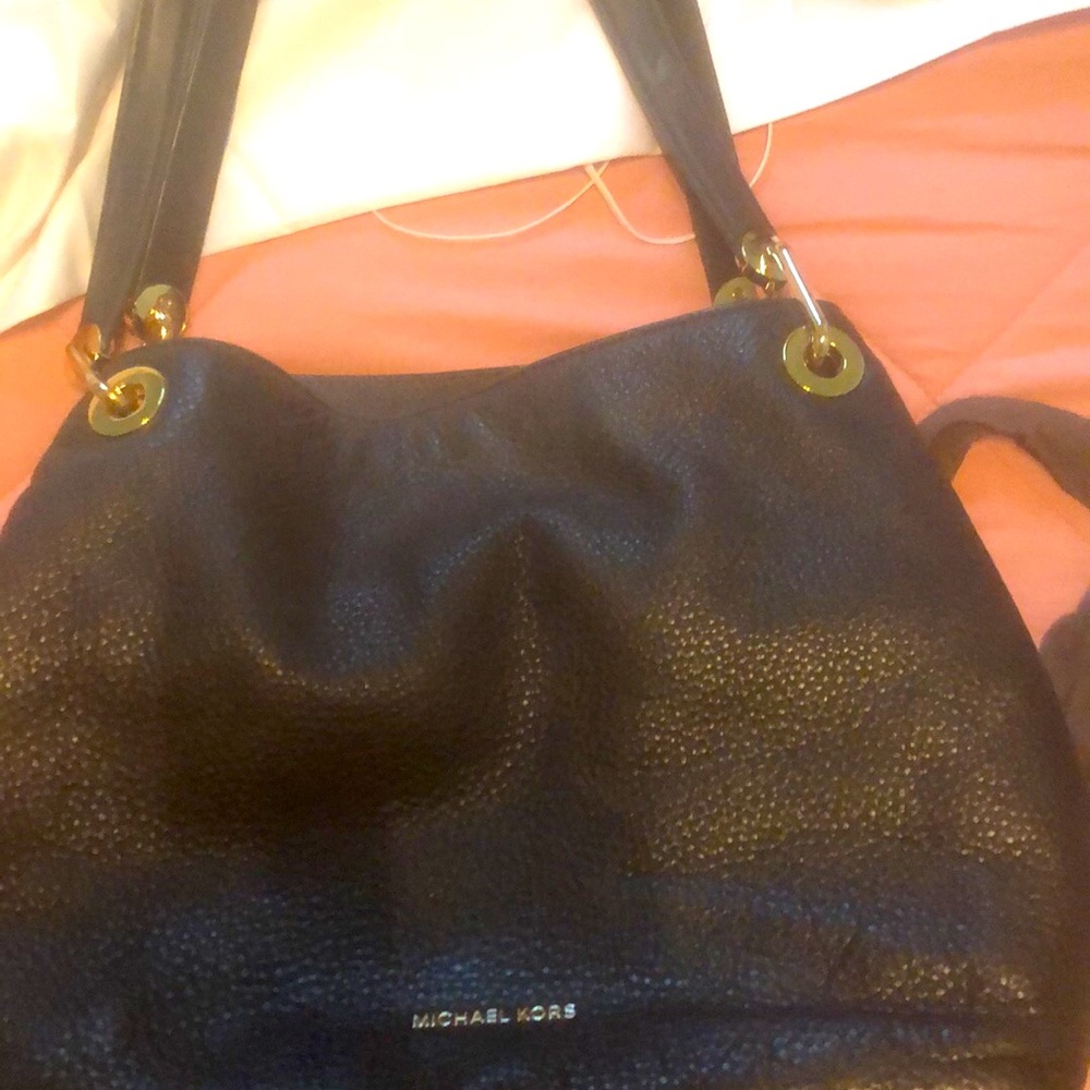 Michael Kors purse, slouchy tote . Used 5 months. In really good condition.